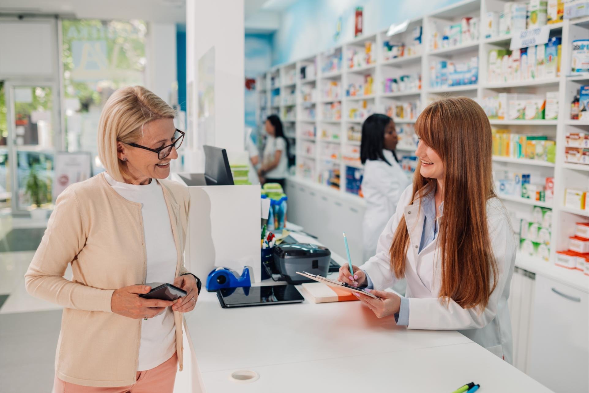 A pharmacist preparing a prescription for a customer